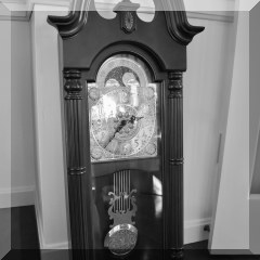D40. Howard Miller Maxwell battery operated chiming wall clock. Model 620-226. 35”h x 16”w x 6.5” d - $295